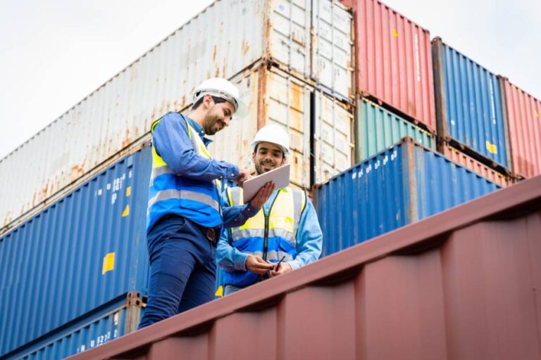 men planning strategies to export merchandise