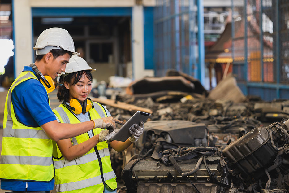 Customs workers handle damaged goods in customs checks